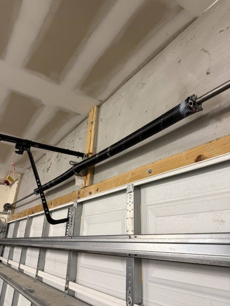 Torsion spring on a garage door, repair by Pro Garage Doors